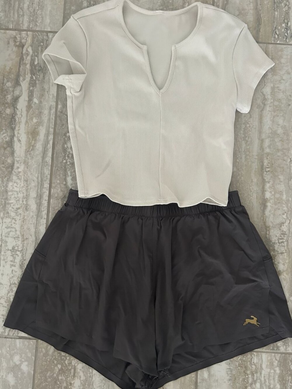 Tracksmith shorts and cute ALO top